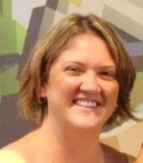 mediumshotsmileywomanposing1I824